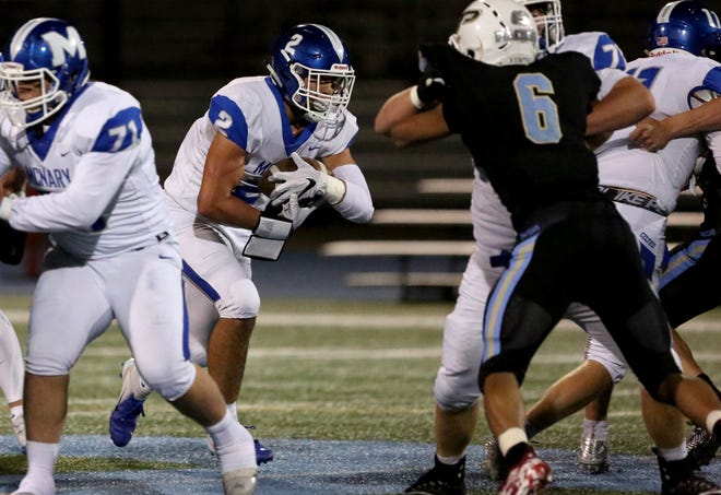 McNary's Jr. Walling (2) runs the ball in the first half of the McNary vs. Lakeridge football game at Lakeridge High School on Friday, Nov. 2, 2018 in Lake Oswego. 