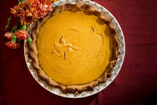 Pumpkin pie with almond crust.