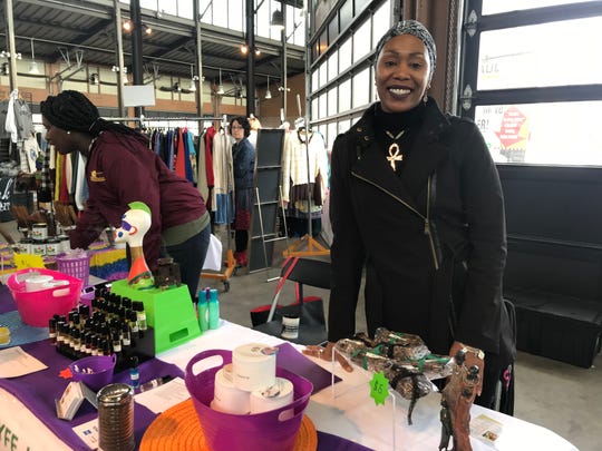Terri Moody, owner of The Naturaly Lyfe, sells her all-natural wares at the All Things Detroit shopping experience at Eastern Market on Sunday, Nov. 4, 2018.