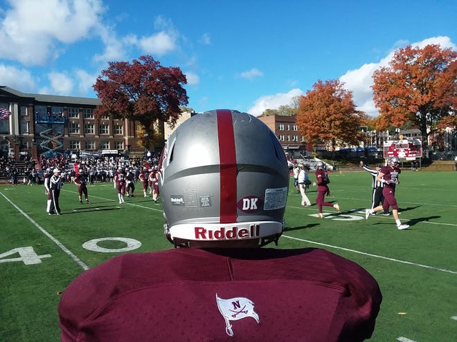 Nutley players wore a decal on their helmet honoring the late Donny Klein, a former football assistant coach who died in an automobile accident last month.