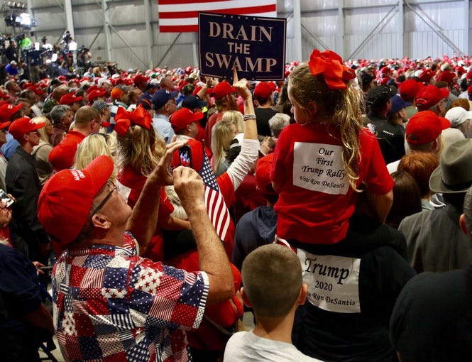 Thousands of supporters pack the ST Engineering hangar at Pensacola International Airport for President Donald Trump's rally ahead of the midterm election.