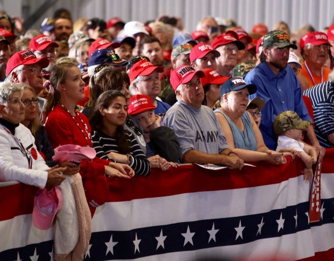 Thousands of supporters pack into the ST Engineering hangar at Pensacola International Airport for President Donald Trump's rally on Saturday, Nov. 3, 2018.