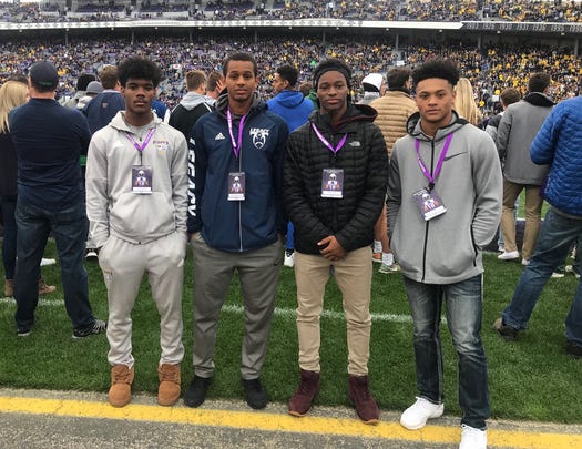 Muskegon's Cameron Martinez, right, is joined at the Michigan-Northwestern game by (from left) Warren De La Salle's Josh DeBerry, Walled Lake Western's Abdur-Rahmaan Yaseen and Farmington Hills Harrison's Rod Heard.