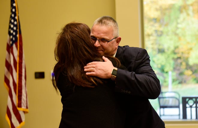 Ron Schumacher celebrates being named president of Terra State Community College. He's served as the college's interim president since former president Jerome Webster resigned in May.