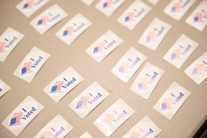 Stickers await voters after they drop their ballots off during early voting at CSU's Lory Student Center on Monday, November 5, 2018. Election judges said a steady stream of students were turning out to vote the day before Election Day. 