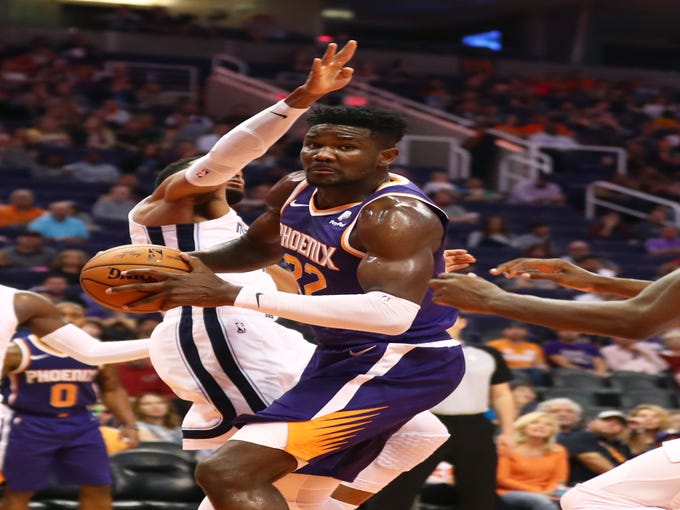 Nov 4, 2018; Phoenix, AZ, USA; Phoenix Suns center Deandre Ayton (22) controls the ball in the fourth quarter against the Memphis Grizzlies at Talking Stick Resort Arena.