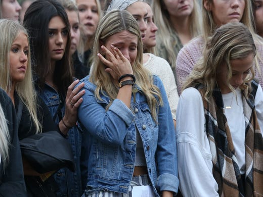 Hundreds of people attended a vigil held at Florida State University in honor of the two lives that were lost on the night of the shooting at Hot Yoga Tallahassee, on Nov. 4, 2018. 