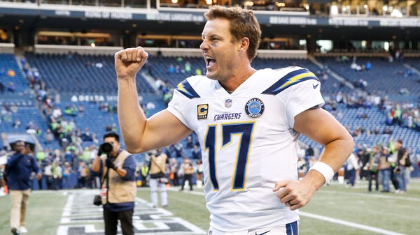 Philip Rivers celebrates a 25-17 win over the...