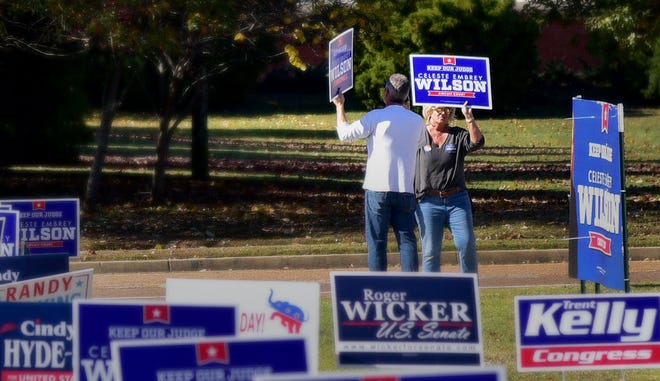 November 6, 2018 - Volunteers show their support as DeSoto county voters show an impressive turnout on election day November 6.