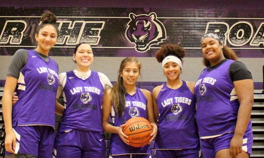 The top players from Millennium's girls basketball team pose before their practice on Monday at Millennium High School on Nov. 5, 2018.
