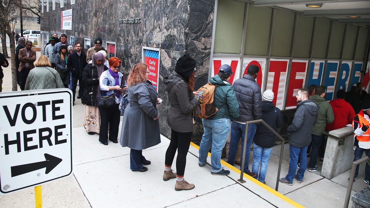 People line up to vote on the last day of early voting at the Minneapolis Early Vote Center on Nov. 5, 2018, in Minneapolis. 
