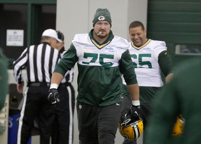 Green Bay Packers offensive tackle Bryan Bulaga (75) arrives at practice Wednesday, November 7, 2018 at the Don Hutson Center in Ashwaubenon, Wis.