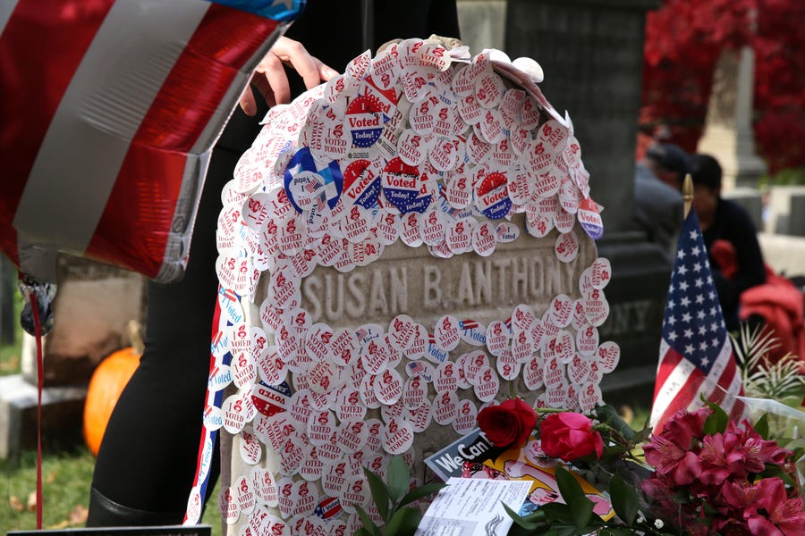 This Nov 8, 2016 photograph shows stickers on the grave of Susan B. Anthony at Mt. Hope Cemetery in Rochester, New York.