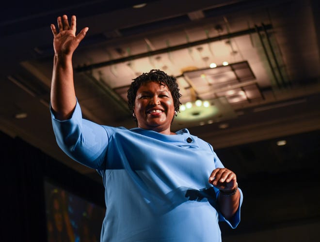 Democratic Georgia gubernatorial candidate Stacey Abrams addresses the crowd in the early morning hours on Wednesday morning at the Hyatt Regency Hotel in downtown Atlanta, GA telling supporters votes still needed to be counted and of the likely chance of a runoff election.