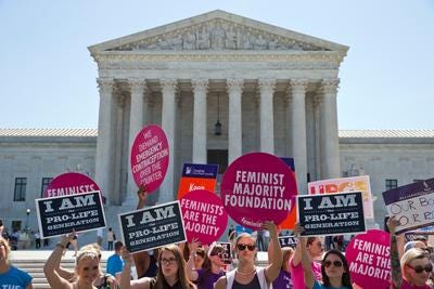 Protesters on both sides of the abortion debate outside the U.S. Supreme Court in 2017.
