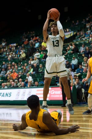 CSU basketball player Lorenzo Jenkins, shown shooting over a Colorado Christian defender during a Nov. 7, 2018, game at Moby Arena, is transferring to Grand Canyon University for his final season, he said Wednesday on Twitter.