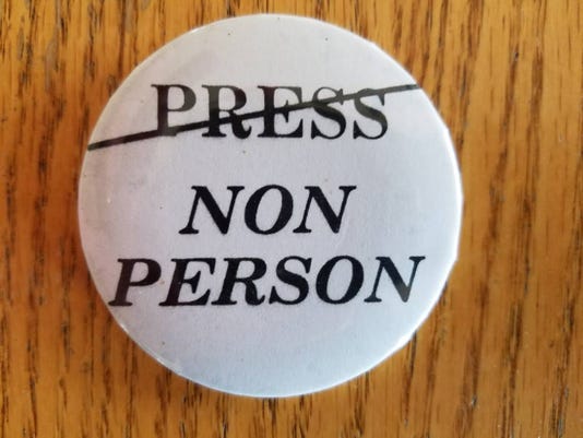 Non-person button