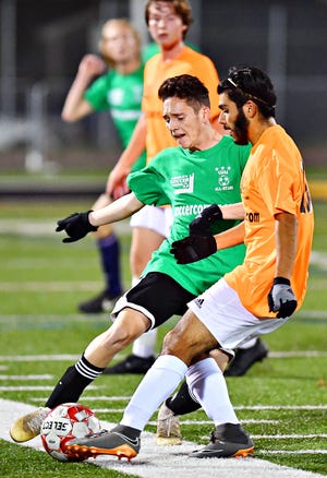 Fairfield's Patrick Pruy, left, and Biglerville's Jorge Acevado compete for control of the ball during YAIAA Boys' Soccer Senior All Star Game action at Horn Field in Red Lion, Wednesday, Nov. 7, 2018. Dawn J. Sagert photo