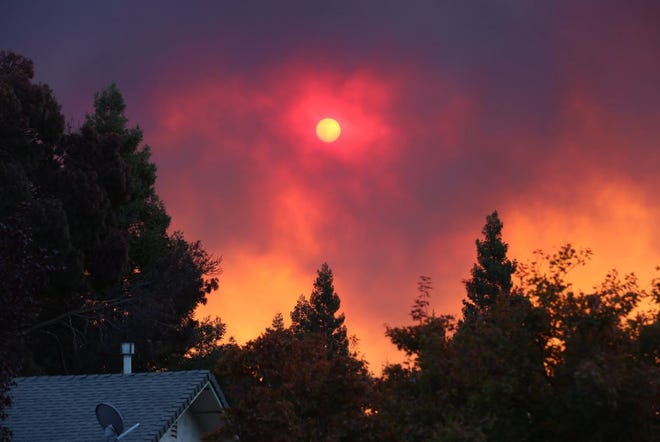 View of Camp Fire burning in Paradise from Chico at 8 a.m. Thursday.