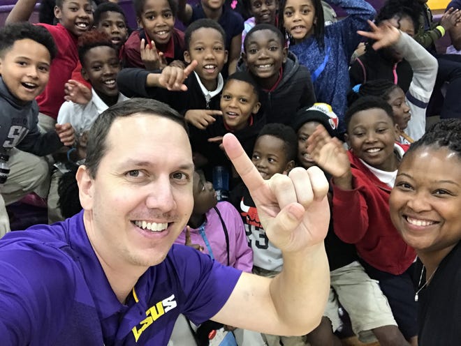 LSUS men's basketball coach Kyle Blankenship has fun with the attendees at Wednesday's Champions of Character game at The Dock.