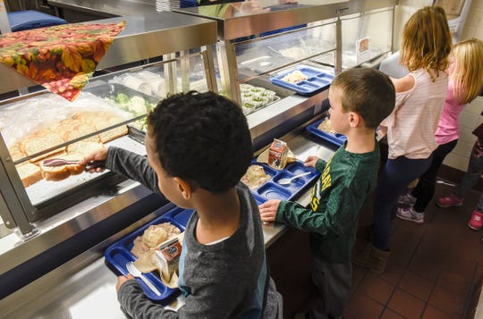 Students get their lunch Thursday, Nov. 8, at Oak Hill Community School.