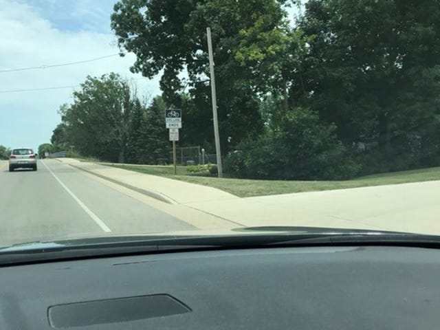A Brown County committee recently decided to allocate money during a resurface to widen the shoulder of Hoffman Road and install bike-friendly signs.