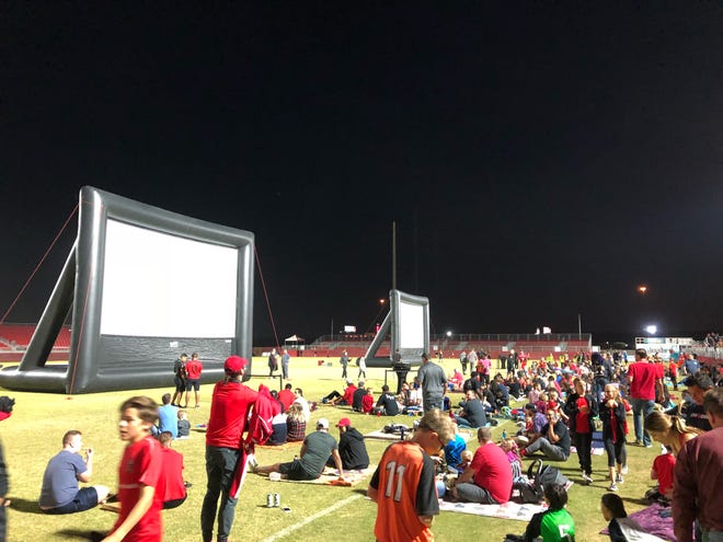 Fans gather at Phoenix Rising FC Soccer Complex to watch a stream of the Rising in the USL Cup championship game in Louisville.