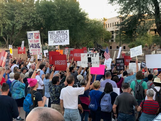Protesters gathered at the Arizona State Capitol to support the Robert Mueller investigation.