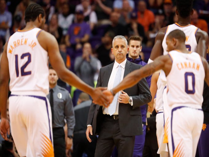 Suns' head coach Igor Kokoskov watches his team head back to the bench during the first half against the Celtics at Talking Stick Resort Arena in Phoenix, Ariz. on November 8, 2018. 