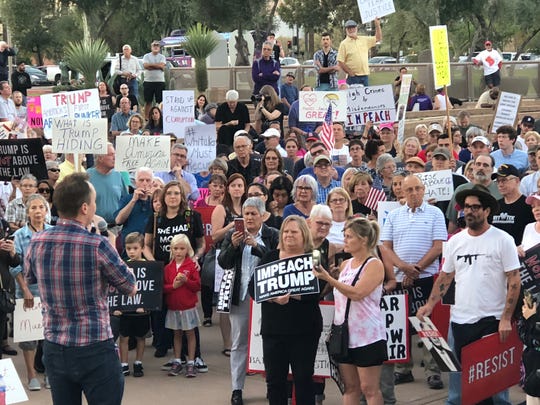 Protesters gathered at the Arizona State Capitol to support the Robert Mueller investigation.