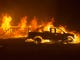 epaselect epa07152472 Fire rages through neighborhoods as the Camp Fire burns out of control through Paradise, fueled by high winds in Butte County, California, USA, 08 November 2018. The nearby communities of Pulga, Paradise and Concow, have been ordered to evacuate the area.  EPA-EFE/PETER DASILVA ORG XMIT: PDS01