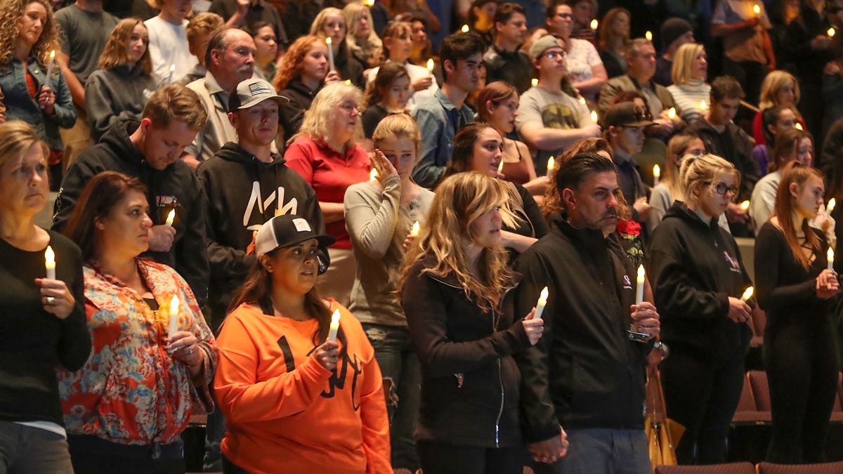 People mourn those lost during the shooting in Thousand Oaks, Calif. during a vigil at the Thousand Oaks Civic Arts Plaza on Nov. 8, 2018.