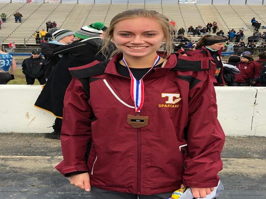 Turpin High Schoolâs Samantha Bush poses for a photo after receiving her 4th place medal at the 2018 Girls Division I Cross Championships, November 10, 2018 at National Trail Raceway Center in Hebron, Ohio