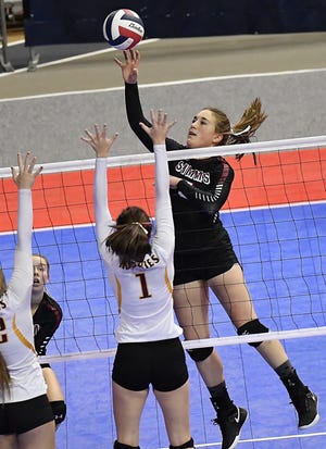 Janessa Willekes of Simms tips the ball in the Class C undefeated semifinal against Belt at the All-Class State Volleyball Tournament at the Brick Breeden Fieldhouse in Bozeman Friday.