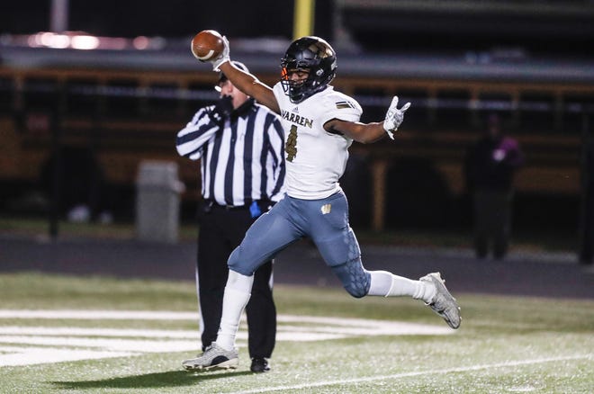The Warren Central High School Warriors wide receiver David Bell (4), celebrates a touchdown during a regional finals game against the North Central High School Panthers at North Central High School on Friday, Nov. 9, 2018. 