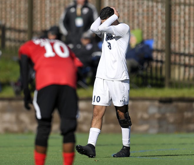 Brighton's Caio De Medeiros reacts after nearly missing a shot on goal during a Class A semifinal at the NYSPHSAA Boys Soccer Championships in Newburgh, N.Y., Saturday, Nov. 10, 2018. Brighton's season ended with a 2-0 loss to Amityville-XI.