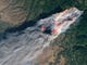 An image from a NASA earth satellite from 10:45 a.m. Thursday shows the extent of the Camp Fire. The photo uses shortwave-infrared light to highlight the active fire.