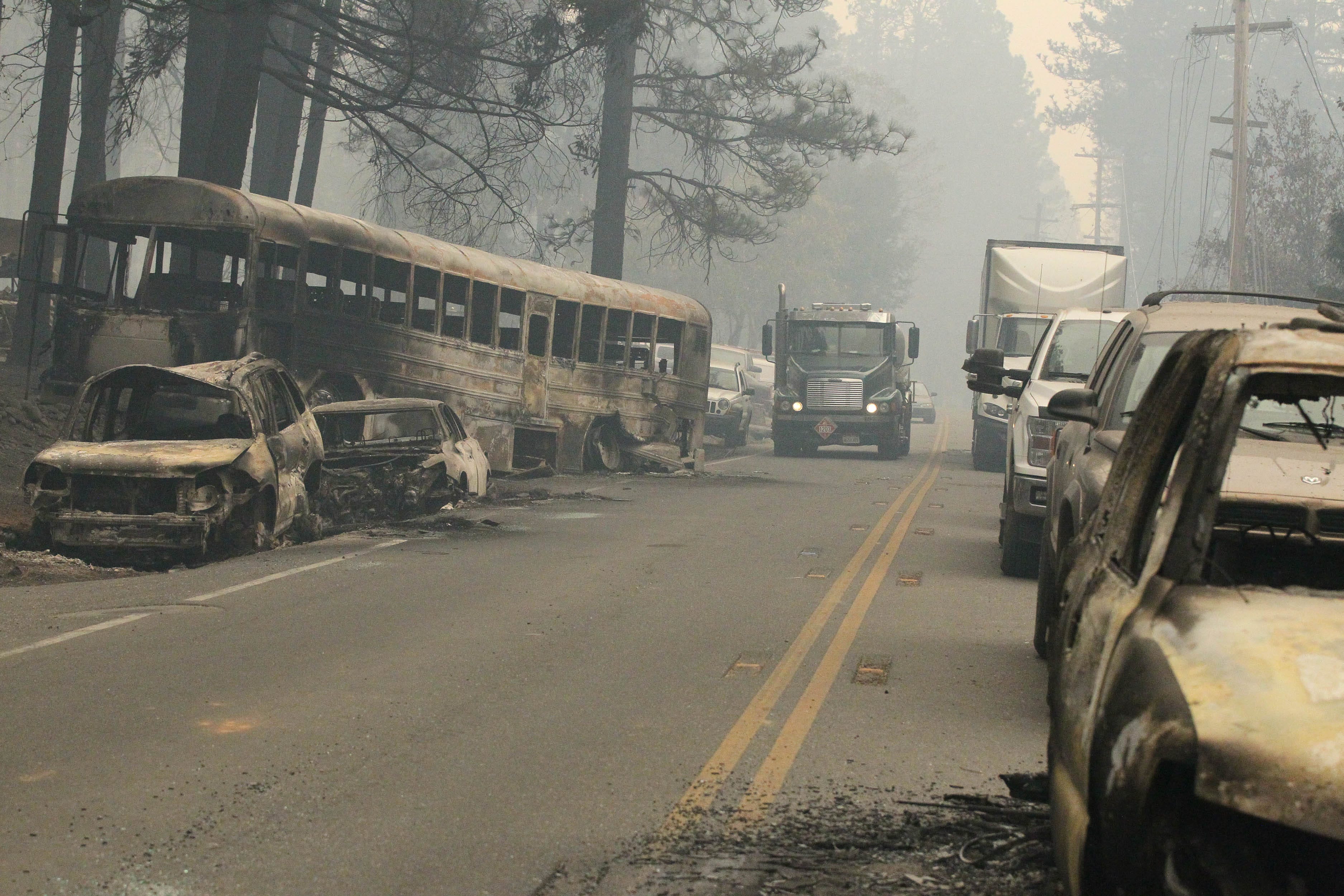 Burned-out vehicles litter roads leading into Paradise in the aftermath of the Camp Fire.