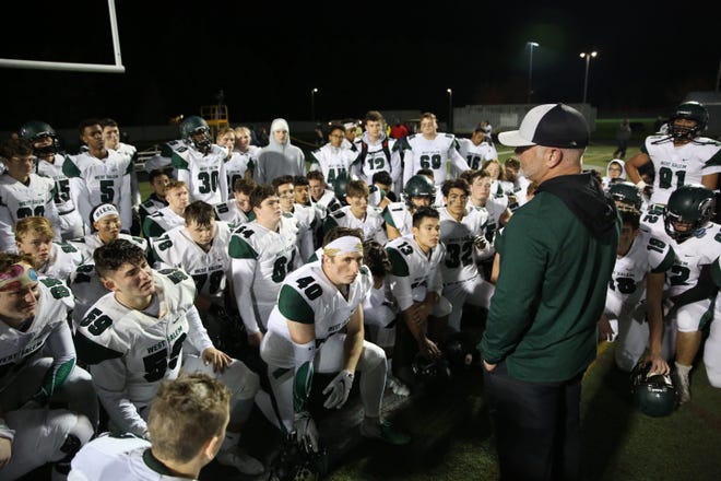 West Salem head coach Shawn Stanley talks to his team after a 24-14 loss against Clackamas High School during the second round of the 6A playoffs in Clackamas on Friday, Nov. 9, 2018. 