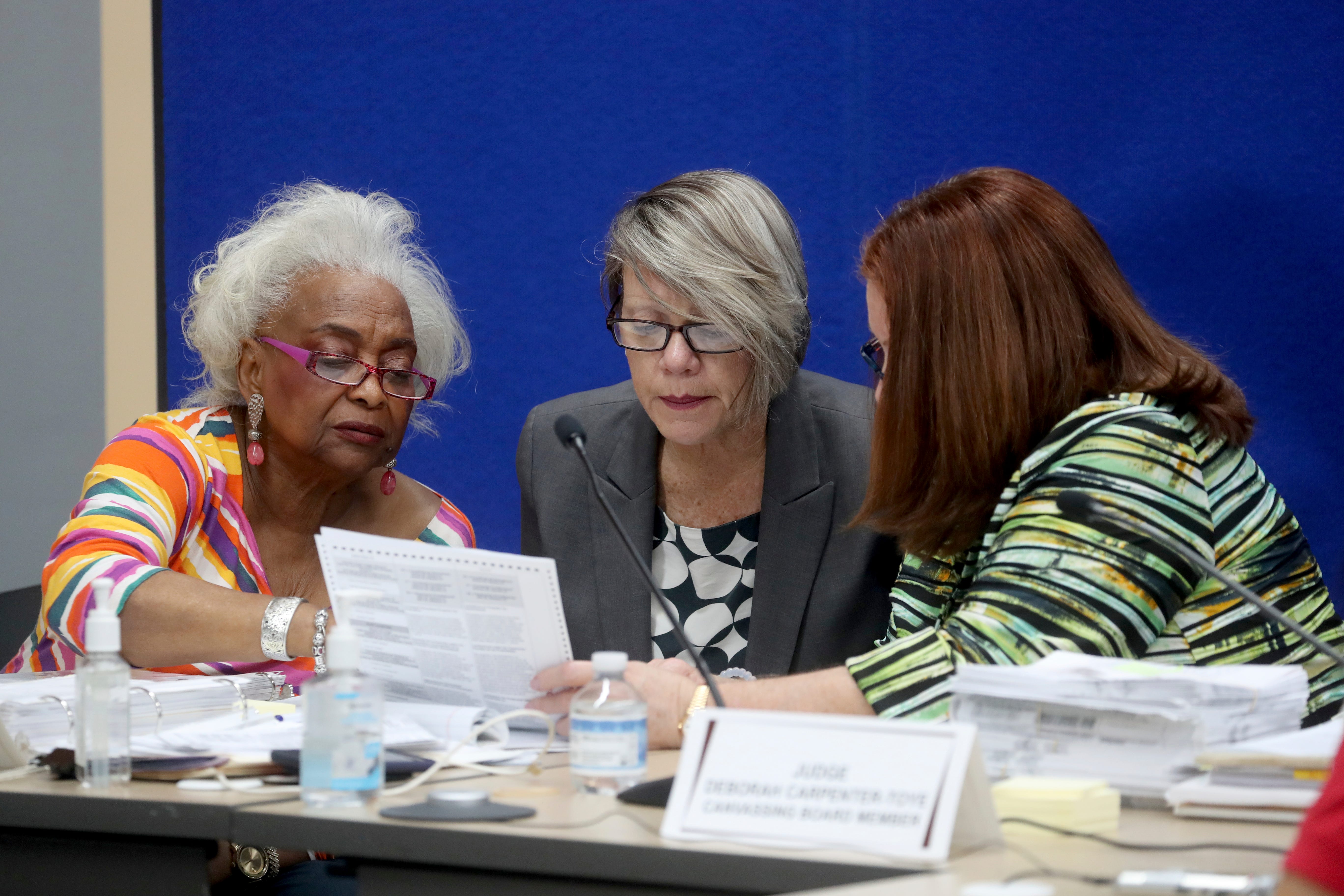 In 2018, then- Broward County Supervisor of Elections Brenda Snipes, Judge Betsy Benson, and Judge Brenda Carpenter-Toye of the Broward County canvassing board continue to count votes, Friday, Nov. 9, 2018, in Lauderhill, Fla.