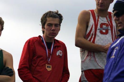 Indian HillÃ¢â¬â¢s Ben Bayless on the podium at the 2018 Boys Division II Cross Championships, November 10, 2018 at National Trail Raceway Center in Hebron, Ohio.