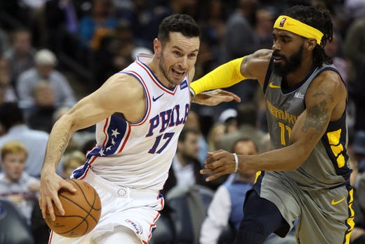 Memphis Grizzlies guard Mike Conley defends Philadelphia 76ers guard JJ Redick during their game at the FedExForum on Saturday, November 10, 2018.