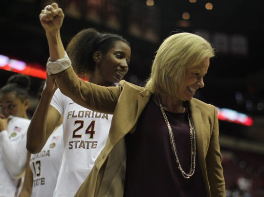 Sue Semrau, a women's basketball coach in the state of Florida, celebrates her victory against Florida at the Tucker Civic Center on November 11, 2018.