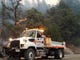 A Caltrans vehicle is parked close to the Cresta Powerhouse near Oroville on Monday morning. Highway closures remained in place in the area due to the Camp Fire in Butte County.