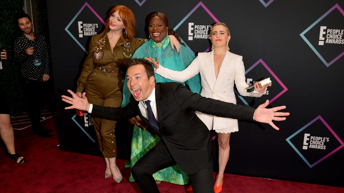 The stars come out to shine at the 2018 People's Choice Awards in Santa Monica, Calif. Jimmy Fallon takes over the shot while Christina Hendricks, (back L-R),Retta and Mae Whitman stand amused on the red carpet. Click ahead to see more celebs.