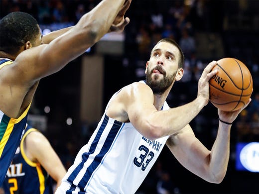 Memphis Grizzlies center Marc Gasol (right) looks for a shot against the Utah Jazz defense during action at the FedExForum in Memphis, Tenn., Monday, November 12, 2018.