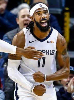 Memphis Grizzlies guard Mike Conley reacts after making a basket while being fouled by Utah Jazz during action at the FedExForum in Memphis, Tenn., Monday, November 12, 2018.