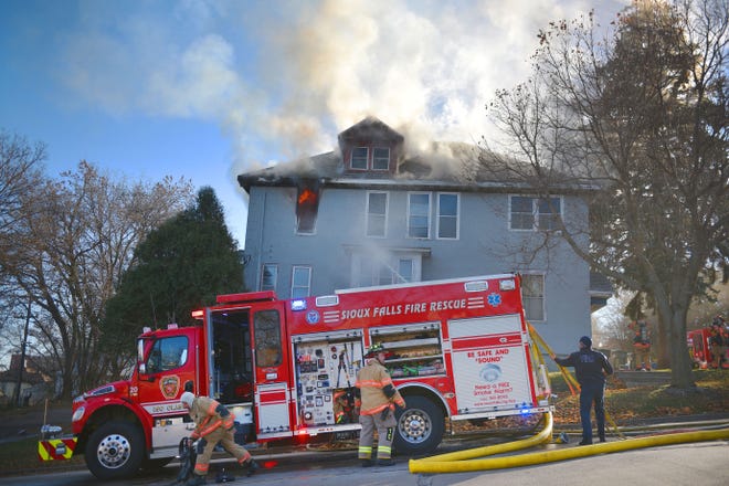 Sioux Falls Fire Rescue puts out a fire at the 300 block of N. Spring Avenue Tuesday, Nov. 13, in Sioux Falls.