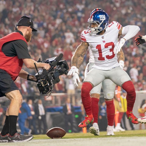 Odell Beckham celebrates after catching a...