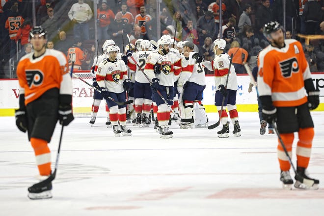 The Florida Panthers celebrate after defeating the Philadelphia Flyers at Wells Fargo Center.